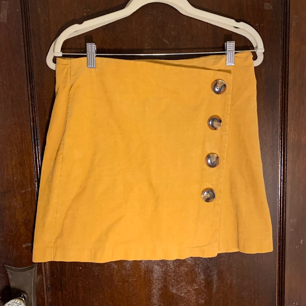 Large corduroy yellow mini skirt